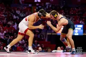 197: Nebraska Cornhusker No. 13 Silas Allred (18-4) wrestles Michigan Wolverine Bobby Striggow (5-7) during a college wrestling match on Friday, February 9, 2024, in Lincoln, Nebraska. Photo by John S. Peterson.