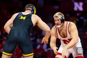 HWT: Nebraska Cornhusker Nash Hutmacher (4-1) wrestles Michigan Wolverine No. 6 Lucas Davison (11-3) during a college wrestling match on Friday, February 9, 2024, in Lincoln, Nebraska. Photo by John S. Peterson.