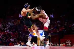165: Nebraska Cornhusker No. 16 Antrell Taylor (15-4) wrestles Michigan Wolverine No. 10 Cameron Amine (8-4) during a college wrestling match on Friday, February 9, 2024, in Lincoln, Nebraska. Photo by John S. Peterson.