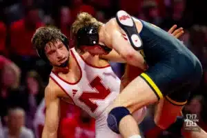 174: Nebraska Cornhusker No. 33 Bubba Wilson (11-8) wrestles Michigan Wolverine No. 3 Shane Griffith (11-2) during a college wrestling match on Friday, February 9, 2024, in Lincoln, Nebraska. Photo by John S. Peterson.