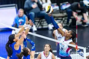 Omaha Supernovas Bethania De La Cruz (18) tips the ball over against the San Diego Mojo during a professional volleyball match on Saturday, February 3, 2024, in Omaha, Nebraska. Photo by John S. Peterson.