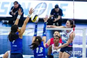 Omaha Supernovas Allison Mayfield (15) spikes the ball against San Diego Mojo Ronika Stone (7) and Nootsara Tomkom (13) in the second set during a professional volleyball match on Saturday, February 3, 2024, in Omaha, Nebraska. Photo by John S. Peterson.