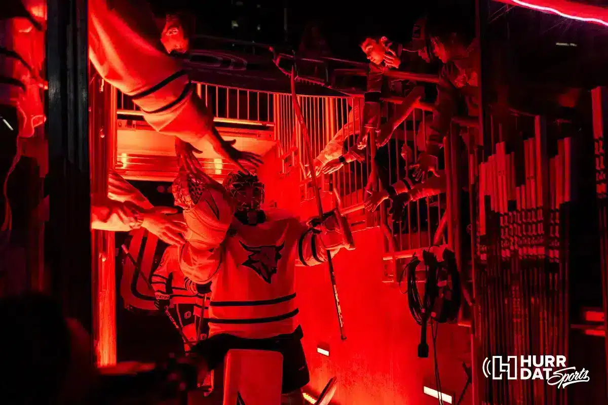 Omaha goaltender Simon Latkoczy (30) leads the Mavs out on to the ice to take on Minn. Duluth during a college hockey match on Friday, February 2, 2024, in Omaha, Nebraska. Photo by John S. Peterson.