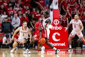 Nebraska Cornhusker guard Sam Hoiberg (1) and forward Juwan Gary (4) guard against Wisconsin Badger guard AJ Storr (2) in the second half during a college basketball game on Thursday, February 1, 2024, in Lincoln, Nebraska. Photo by John S. Peterson.