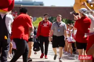 Nebraska Cornhusker quarterback Dylan Raiola (15) leads the Huskers on the Legacy Walk before taking on UTEP during the college football game Saturday, August 31, 2024, in Lincoln, Nebraska. Photo John S. Peterson.