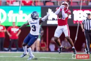 Nebraska Cornhusker defensive back Rahmir Stewart (32) intercepts the ball against UTEP Miner wide receiver Jaden Smith (3) during the college football game Saturday, August 31, 2024, in Lincoln, Nebraska. Photo John S. Peterson.