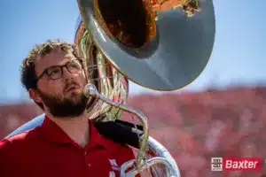 Nebraska Cornhusker Marching Band member glancing up as he lines up for the tunnel walk during the college football game Saturday, August 31, 2024, in Lincoln, Nebraska. Photo John S. Peterson.