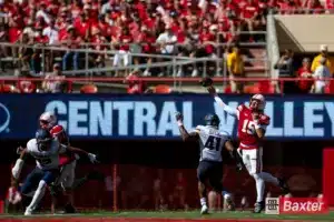Nebraska Cornhusker quarterback Dylan Raiola (15) throws a pass against UTEP Miner linebacker Dorian Hopkins (41) during the college football game Saturday, August 31, 2024, in Lincoln, Nebraska. Photo John S. Peterson.