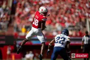 Nebraska Cornhusker wide receiver Isaiah Neyor (18) makes a catch against UTEP Miner linebacker Josiah Allen (22) during the college football game Saturday, August 31, 2024, in Lincoln, Nebraska. Photo John S. Peterson.