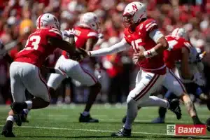 Nebraska Cornhusker quarterback Dylan Raiola (15) hands the ball off to Dante Dowdell against the UTEP Miners in the first quarter during the college football game Saturday, August 31, 2024, in Lincoln, Nebraska. Photo John S. Peterson.
