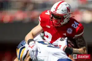 Nebraska Cornhusker tight end Thomas Fidone II (24) tackled by UTEP Miner cornerback Jaylon Shelton (9) after making a catch in the first quarter during the college football game Saturday, August 31, 2024, in Lincoln, Nebraska. Photo John S. Peterson.