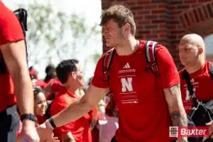 Nebraska Cornhusker tight end Thomas Fidone II (24) gives fives to the fans on the Legacy Walk before taking on UTEP during the college football game Saturday, August 31, 2024, in Lincoln, Nebraska. Photo John S. Peterson.