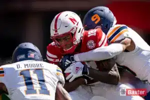 Nebraska Cornhuskers wide receiver Isaiah Neyor (18) is tackled during a game against the UTEP Miners Saturday, August 31 in Memorial Stadium in Lincoln, Nebraska. Photo by Eric Francis