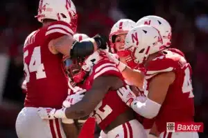 Nebraska Cornhuskers running back Gabe Ervin Jr. (22) celebrates with his teammates after a score during a game against the UTEP Miners Saturday, August 31 in Memorial Stadium in Lincoln, Nebraska. Photo by Eric Francis