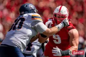 Nebraska Cornhuskers defensive lineman Ty Robinson (9) fights off a blocker during a game against the UTEP Miners Saturday, August 31 in Memorial Stadium in Lincoln, Nebraska. Photo by Eric Francis