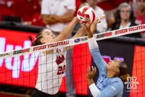 Nebraska Cornhusker Lindsay Krause (22) blocks the ball against Texas A&M CC Islander Alex Hoglund (16) in the first set during the college volleyball game Friday, August 30, 2024, in Lincoln, Nebraska. Photo John S. Peterson.
