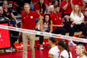 Nebraska Cornhusker head coach John Cook calls for a review during the Red/White Volleyball Game Saturday, August 24, 2024, in Lincoln, Nebraska. Photo John S. Peterson.