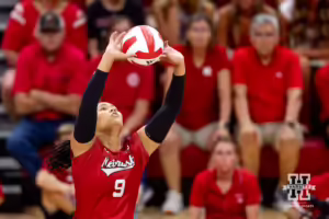 Nebraska Cornhusker Kenndi Orr (9) sets the ball during the Red/White Volleyball Game Saturday, August 24, 2024, in Lincoln, Nebraska. Photo John S. Peterson.