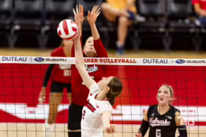 Nebraska Cornhusker Bergen Reilly (2) hits the ball against Lauren Stivrins during the Red/White Volleyball Game Saturday, August 24, 2024, in Lincoln, Nebraska. Photo John S. Peterson.