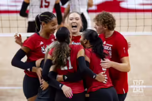 Former Nebraska Cornhusker player Lauren Strivens celebrates with her teammates during the Red/White Volleyball Game Saturday, August 24, 2024, in Lincoln, Nebraska. Photo John S. Peterson.