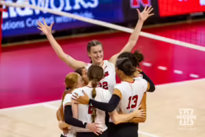 Nebraska Cornhusker Skyler Pierce (21) digs the ball during the Red/White Volleyball Game Saturday, August 24, 2024, in Lincoln, Nebraska. Photo John S. Peterson.