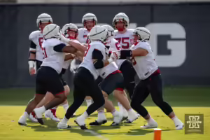 Nebraska Cornhusker offensive line working on pass blocking during football practice Friday, August 16, 2024, in Lincoln, Nebraska. Photo John S. Peterson.