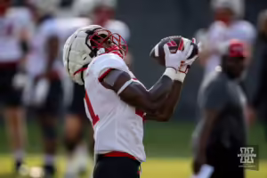 Nebraska Cornhusker Emmett Johnson (21) makes a catch during football practice Friday, August 16, 2024, in Lincoln, Nebraska. Photo John S. Peterson.