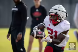 Nebraska Cornhusker Emmett Johnson (21) makes catch during football practice Friday, August 16, 2024, in Lincoln, Nebraska. Photo John S. Peterson.