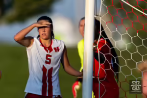 Nebraska Cornhusker midfielder Ella Guyott (5) scouts out a corner kick against the Oklahoma St. Cowgirls in the first half during a college women's soccer match Friday, August 16, 2024, in Lincoln, Nebraska. Photo John S. Peterson.