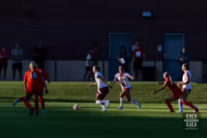 Nebraska Cornhusker midfielder Sadie Waite (11) dribbles the ball against the Oklahoma St. Cowgirls during a college women's soccer match Friday, August 16, 2024, in Lincoln, Nebraska. Photo John S. Peterson.