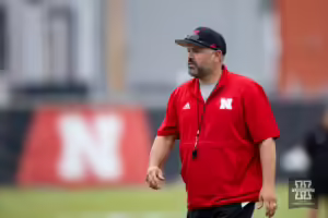 Nebraska Cornhusker head coach Matt Rhule walks on the field during football practice Friday, August 9, 2024, in Lincoln, Nebraska. Photo John S. Peterson.