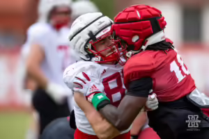 Nebraska Cornhusker Nate Boerkircher (87) blocks Princewill Umanmielen (18) during football practice Friday, August 9, 2024, in Lincoln, Nebraska. Photo John S. Peterson.