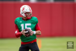 Nebraska Cornhusker Dylan Raiola (15) drops back to pass during football practice Friday, August 9, 2024, in Lincoln, Nebraska. Photo John S. Peterson.