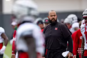 Nebraska coach Donovan Raiola running drills during football practice Friday, August 9, 2024, in Lincoln, Nebraska. Photo John S. Peterson.