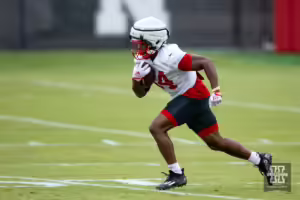 Nebraska Cornhusker Rahmir Johnson (14) running with the ball during football practice Friday, August 9, 2024, in Lincoln, Nebraska. Photo John S. Peterson.
