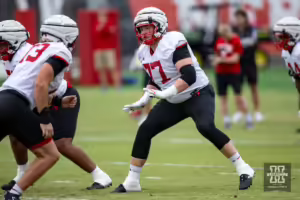Nebraska Cornhusker Gunnar Gottula (77) running drills during football practice Friday, August 9, 2024, in Lincoln, Nebraska. Photo John S. Peterson.