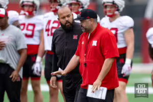 Nebraska Cornhusker head coach Matt Rhule talks to coach Donovan Raiola during football practice Friday, August 9, 2024, in Lincoln, Nebraska. Photo John S. Peterson.