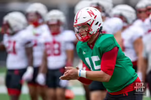 Nebraska Cornhusker Dylan Raiola (15) readies for a snap during football practice Friday, August 9, 2024, in Lincoln, Nebraska. Photo John S. Peterson.