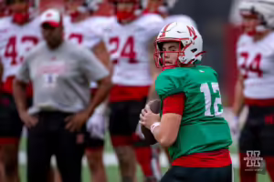 Nebraska Cornhusker Daniel Kaelin (12) drops back to pass during football practice Friday, August 9, 2024, in Lincoln, Nebraska. Photo John S. Peterson.