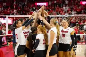 Nebraska Cornhuskers huddles up after the win over the USC Trojans during a college volleyball match Sunday, September 29, 2024, in Lincoln, Nebraska. Photo by John S. Peterson.