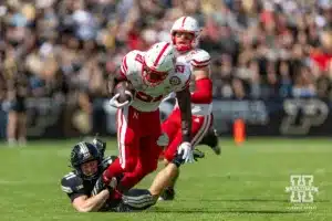 Nebraska Cornhusker running back Emmett Johnson (21) tackled by Nebraska Cornhusker running back Ryker Evans (31) during a college football game Saturday, September 28, 2024, in West Lafayette, Indiana. Photo by John S. Peterson.