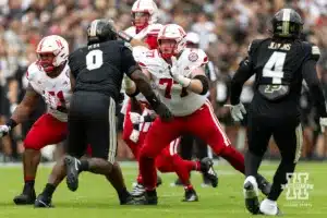 Nebraska Cornhusker offensive lineman Gunnar Gottula (77) pass blocking against Purdue Boilermaker defensive lineman Jeffrey M'Ba (0) during a college football game Saturday, September 28, 2024, in West Lafayette, Indiana. Photo by John S. Peterson.