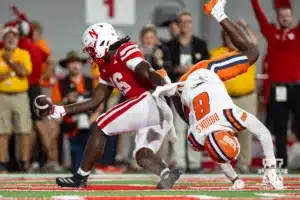 Nebraska Cornhusker wide receiver Janiran Bonner (16) runs in for a touchdown against Illinois Fighting Illini wide receiver Malik Elzy (8) during a college football game Firiday, September 20, 2024, in Lincoln, Nebraska. Photo by John S. Peterson.