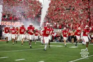 Nebraska Cornhusker quarterback Dylan Raiola (15) leads the Huskers before taking on the Illinois Fighting Illini during a college football game Firiday, September 20, 2024, in Lincoln, Nebraska. Photo by John S. Peterson.