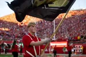 Nebraska Cornhusker band member holding a Purdue flag during the pre-game activities before a college football game Illinois Fighting Illini Firiday, September 20, 2024, in Lincoln, Nebraska. Photo by John S. Peterson.