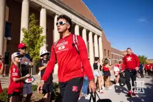 Nebraska Cornhusker quarterback Dylan Raiola leads the Huskers on the Legacy Walk before taking on the Illinois Fighting Illini during a college football game Firiday, September 20, 2024, in Lincoln, Nebraska. Photo by John S. Peterson.
