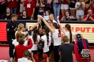 Nebraska Cornhuskers celebrate their sweep over the Stanford Cardinal during a college volleyball match Wednesday, September 18, 2024, in Lincoln, Nebraska. Photo by John S. Peterson.