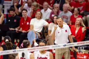 Nebraska Cornhusker head coach gives a fist pump against the Stanford Cardinal in the third set during a college volleyball match Wednesday, September 18, 2024, in Lincoln, Nebraska. Photo by John S. Peterson.
