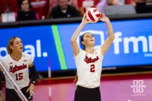Nebraska Cornhusker Bergen Reilly (2) sets the ball against the Stanford Cardinal in the second set during a college volleyball match Wednesday, September 18, 2024, in Lincoln, Nebraska. Photo by John S. Peterson.