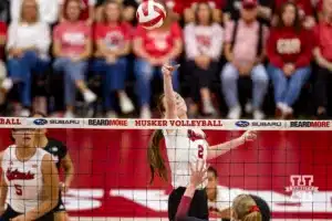 Nebraska Cornhusker Bergen Reilly (2) tips the ball over the net for a kill against the Stanford Cardinal in the second set during a college volleyball match Wednesday, September 18, 2024, in Lincoln, Nebraska. Photo by John S. Peterson.